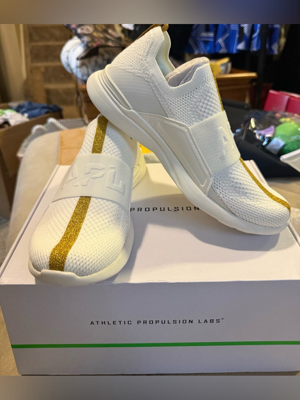 APL Women's TechLoom Bliss cream with gold stripe